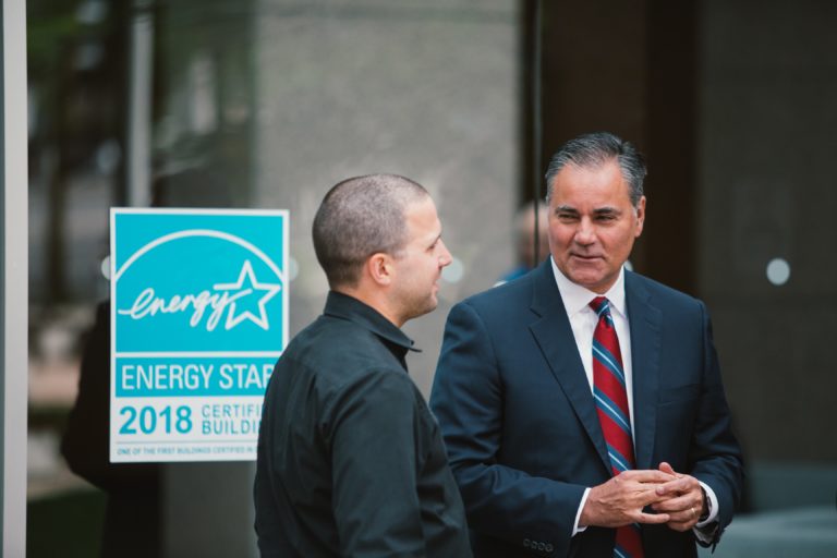 energy star sign and two persons