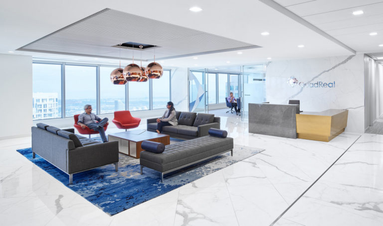 People sitting in office lobby interior